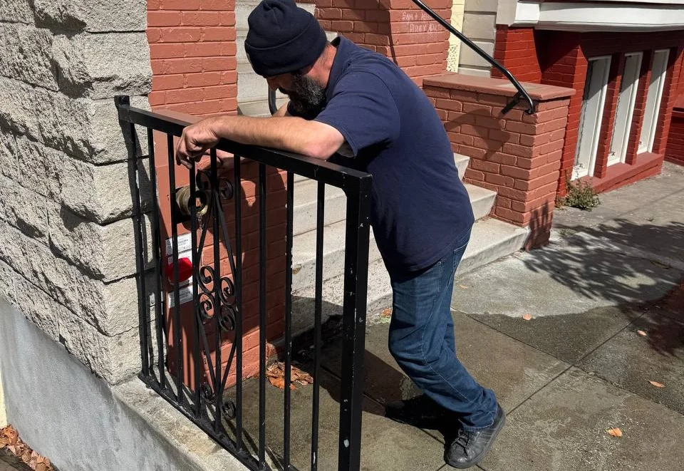 Testing and inspection of the fire sprinkler system water connections on Castro District, San Francisco.